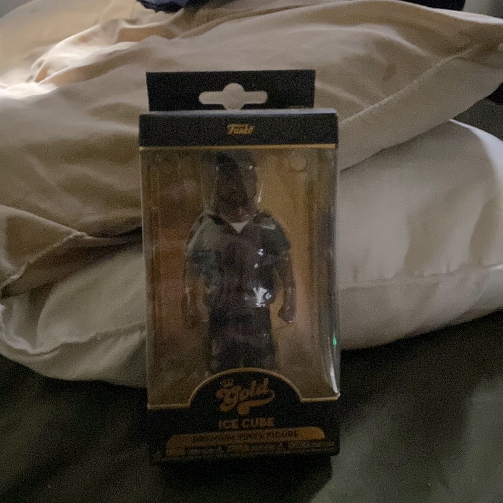 A funko gold ice cube premium vinyl figure